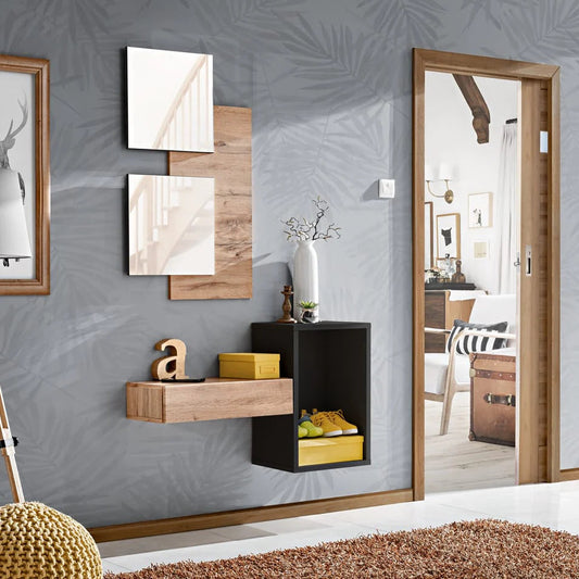 Modern interior design with wall art, shelves, and a mirror.