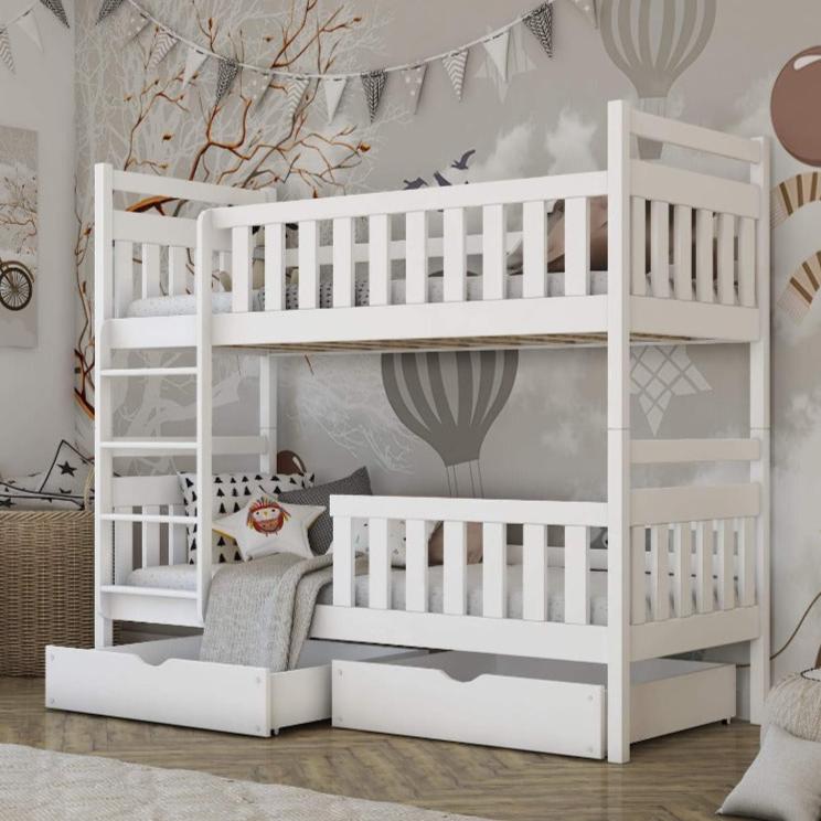 White bunk bed with pull-out trundle in a room setting