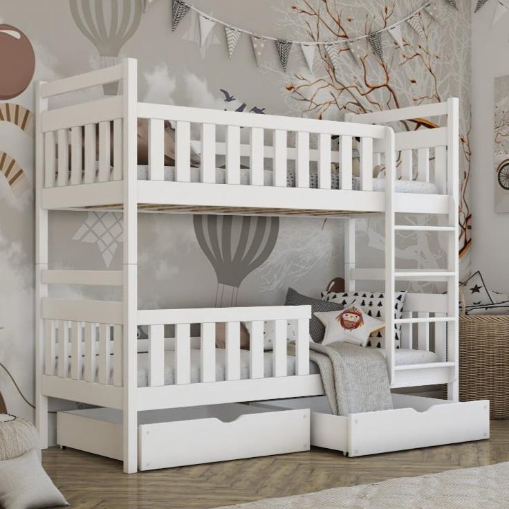 White bunk bed with storage drawers in a room with decorative wall art.