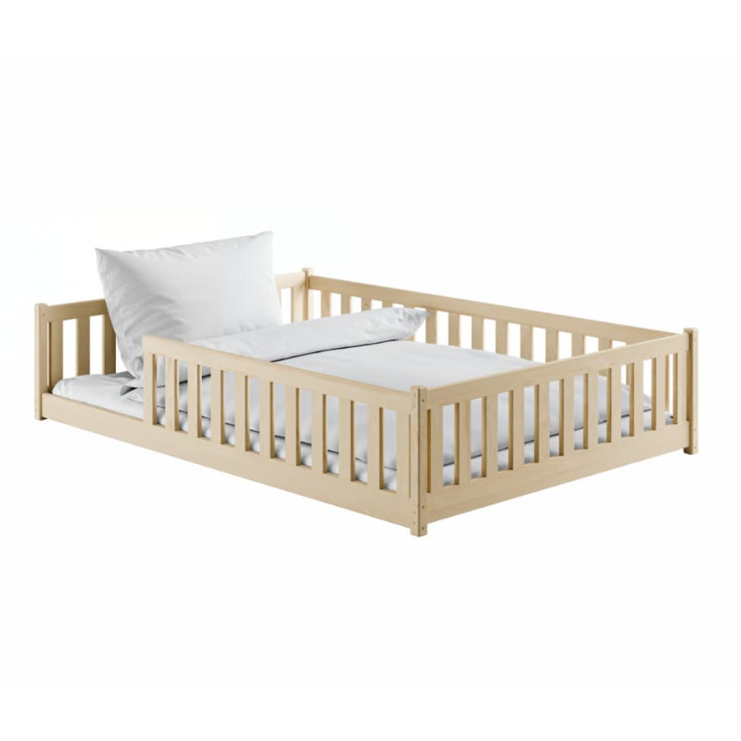 Beige children's bed with white bedding on a white background