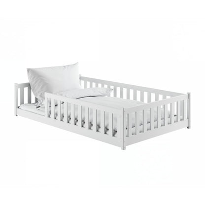 White wooden bed with a pillow on a white background