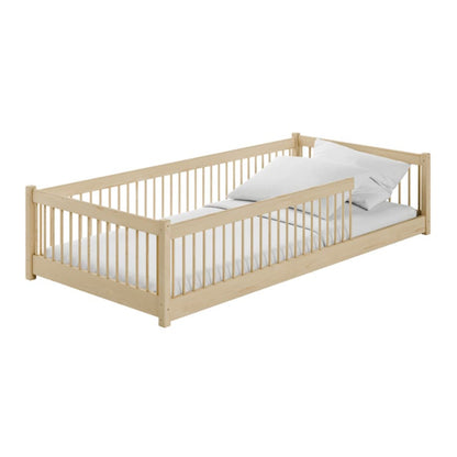 Beige crib with white mattress on a white background