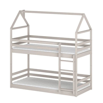 Children's house-shaped bed with white mattress on a white background