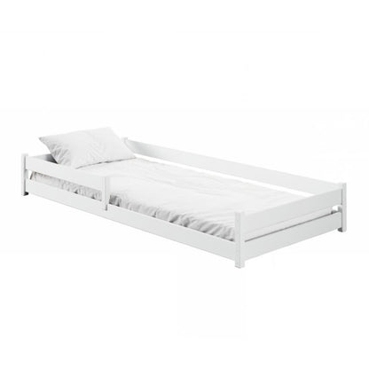 White bed frame with a pillow on a white background