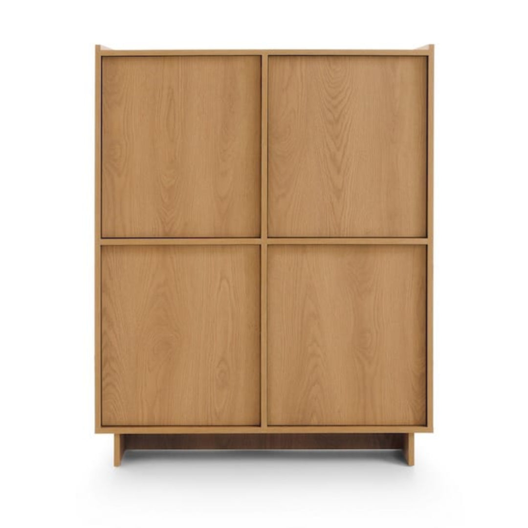 Wooden cabinet with four doors on a white background