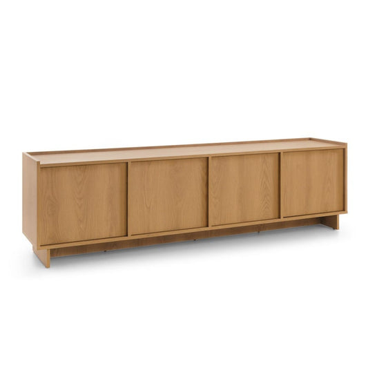Wooden sideboard with four doors on a white background