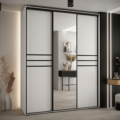 Modern sliding wardrobe with glass panels in a stylish room setting.