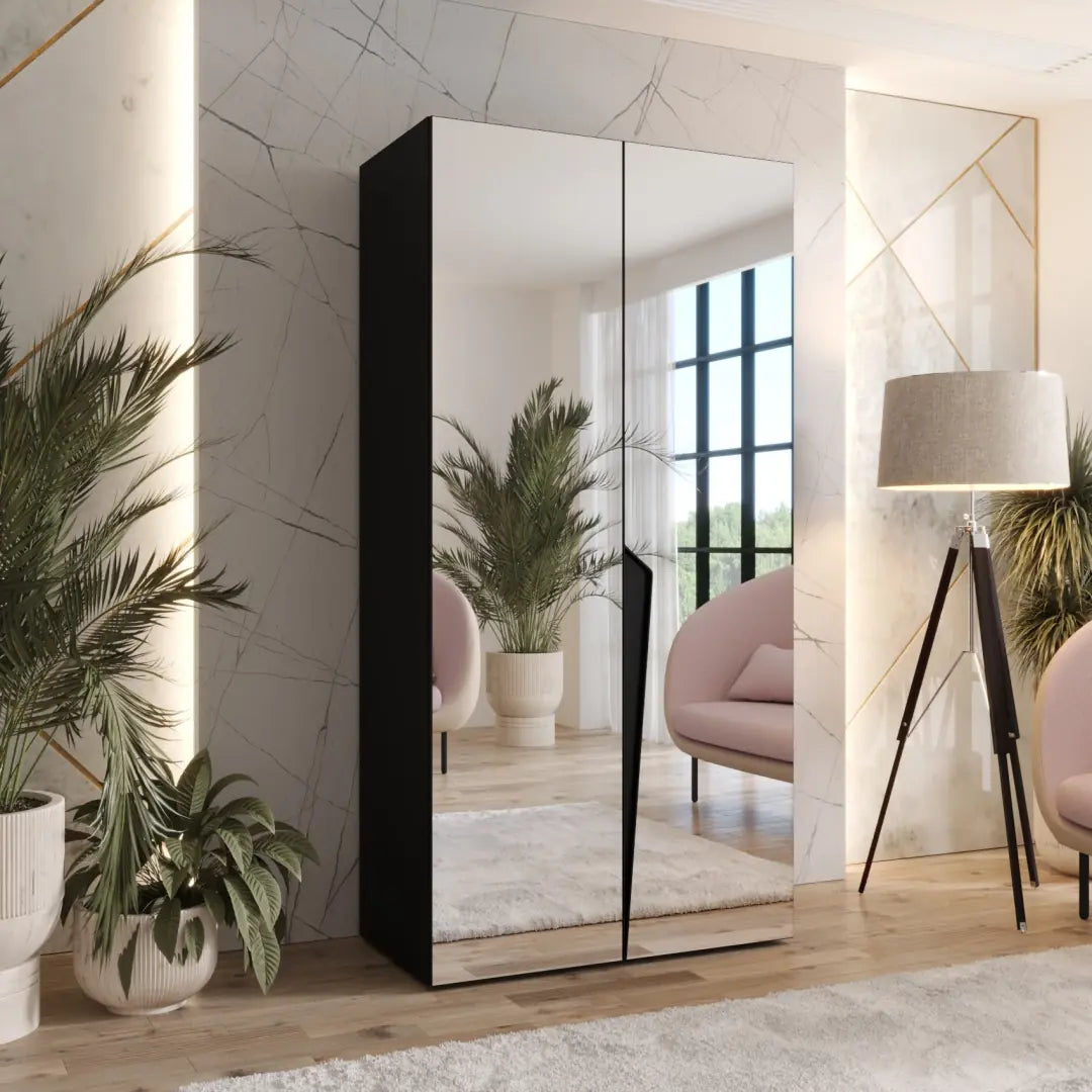 Modern wardrobe with mirror in a stylish room with plants and decor.