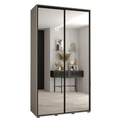 Modern wardrobe with sliding mirrored doors in a minimalistic room.