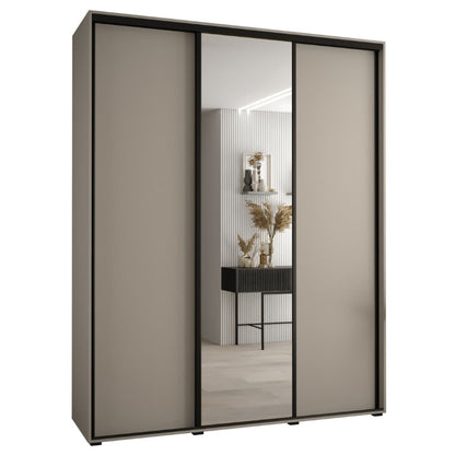 Sliding door wardrobe with beige doors and a mirror panel, interior showing decor items.
