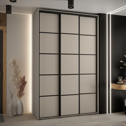 Modern sliding wardrobe door with geometric design in a stylish room setting.