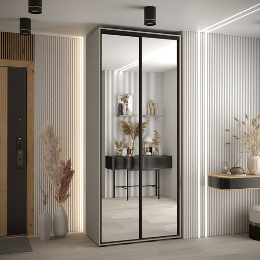 Modern wardrobe with mirror doors in a stylish room setting.