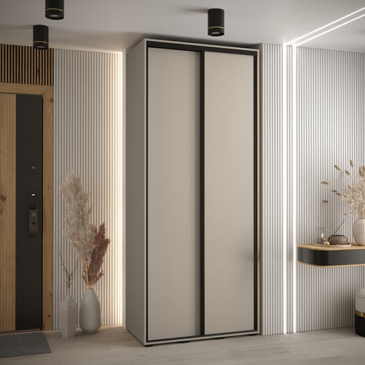 Modern wardrobe with sliding doors in a room with decorative elements.