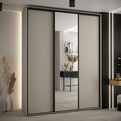 Modern sliding wardrobe with mirror doors in a stylish room setting.