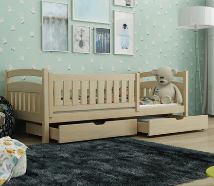 Children's room with a wooden bed, teddy bear, and decorative elements.