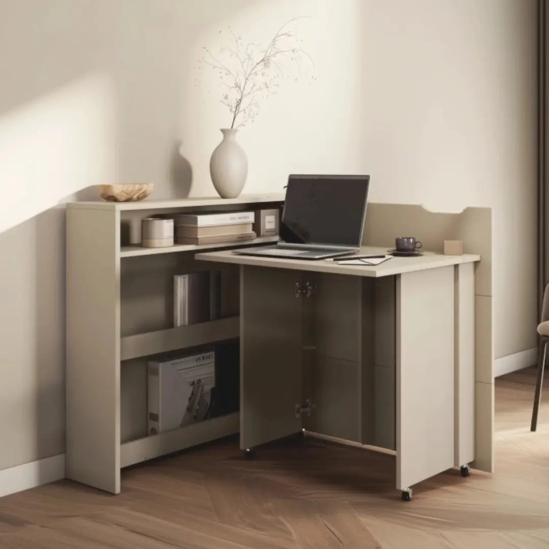 Corner office desk with a laptop and decorative items in a home office setting.