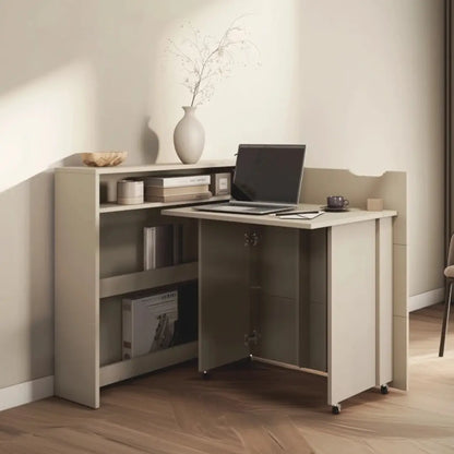 Corner office desk with a laptop and decorative items in a home office setting.