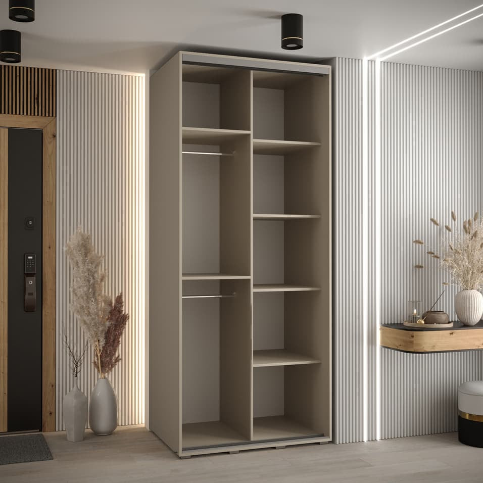 Modern interior with a tall beige wardrobe and decorative elements.