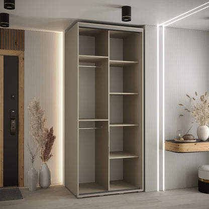 Modern interior with a tall beige wardrobe and decorative elements.