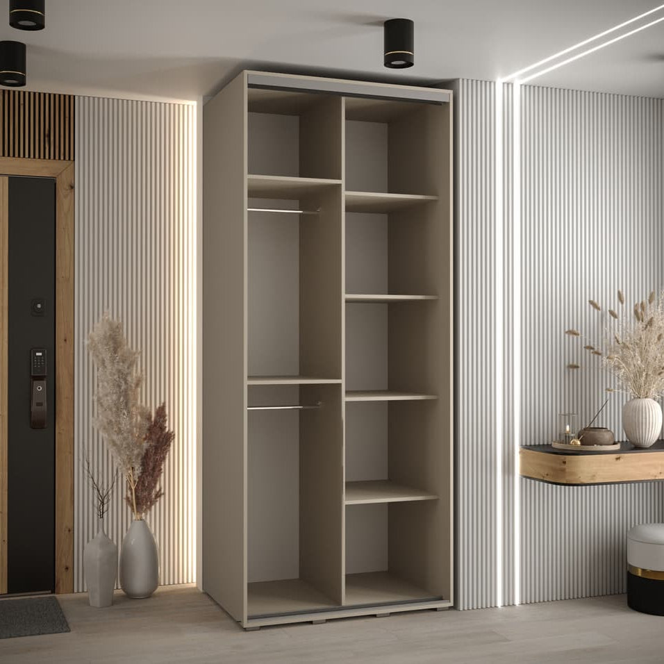 Modern interior with a tall beige wardrobe and decorative elements.