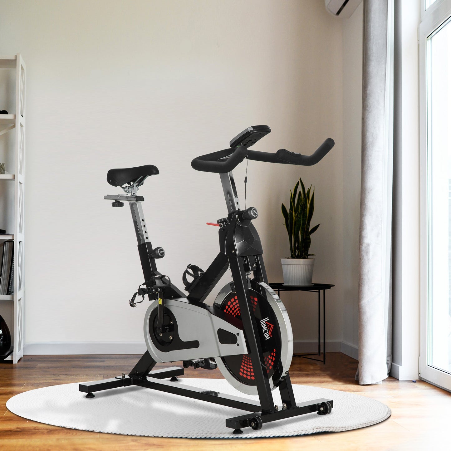 Indoor Exercise Bike, Stationary Bike, Cycling Machine with Adjustable Seat & Resistance, Wheels, 18kg Flywheel, Cup Holder and LCD Monitor